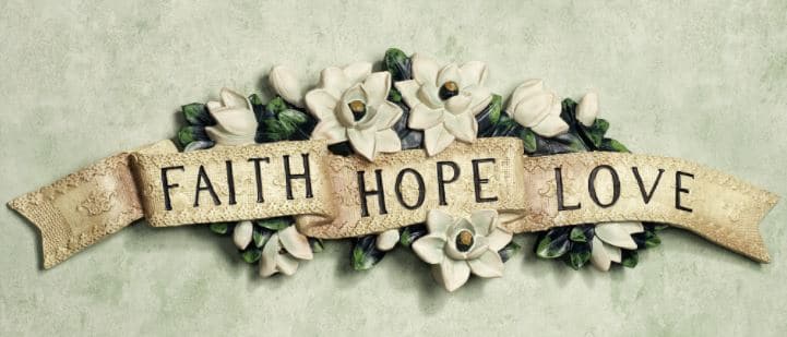 Picture of a plaque with the words: faith, hope, love