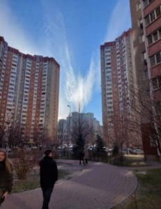 Photo of an angel situated in the sky over a city in Ukraine